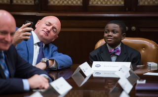 Photo Credit: (NASA/Aubrey Gemignani) Astronaut Mark Kelly, takes a selfie with Kid Science Advisor Jacob Leggette during a meeting with ten other Kid Science Advisors to discuss what they think is important in science, technology, and innovation, Friday, October 21, 2016 at the White House. After a question from Jacob at the White House Science Fair about whether President Obama had a Kid Science Advisor, the White House launched a Kid Science Advisor campaign, which drew over 2,500 ideas from students about science and STEM education.
